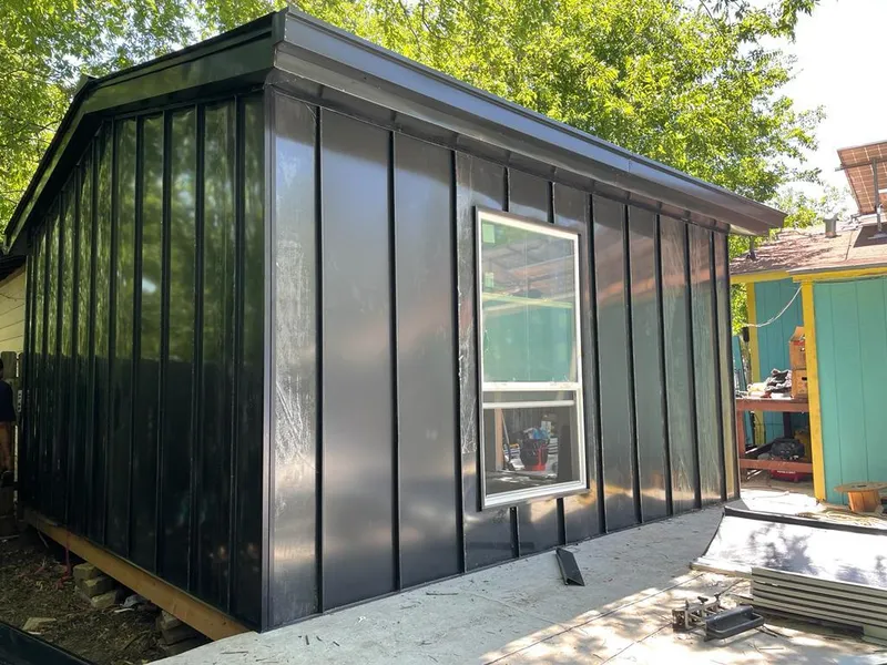 Black standing seam metal wall panels for Roof Inspection in Spanish Springs