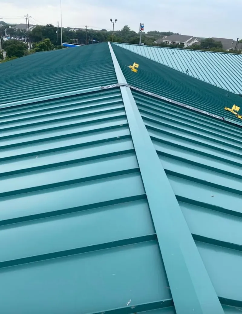 Green commercial metal roof ridge and valley for Metal Roof Repair in Spanish Springs